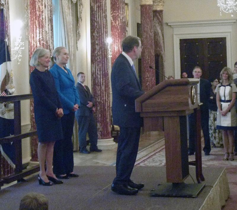 Ambassador's private swearing-in ceremony last year, which was presided over by U.S. Secretary of State Hillary Clinton, and held at the Department of State Headquarters in Washington, D.C. You can see his wife, Faith, standing with Secretary of State Clinton while the Ambassador makes his remarks. COURTESY SIPPICAN HISTORICAL SOCIETY